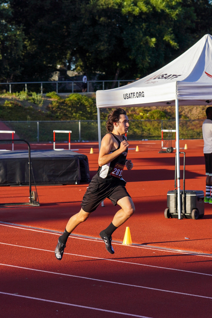 Running on the track at sunrise